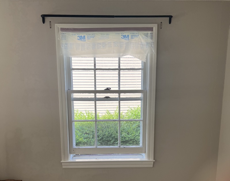 Prepare to plastic wrap the window